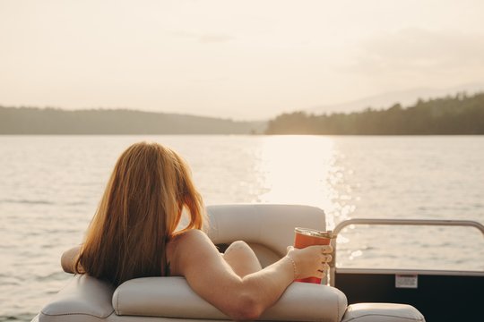 Woman on boat on Lake James in Nebo, N.C.