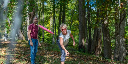Playing disc golf at North Cove Social Club.jpg