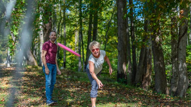 Playing disc golf at North Cove Social Club.jpg